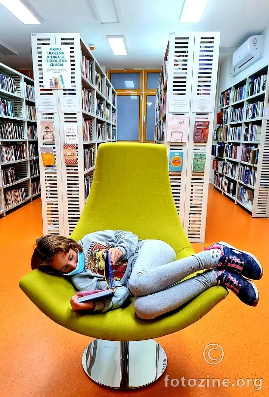 Sweet child in library