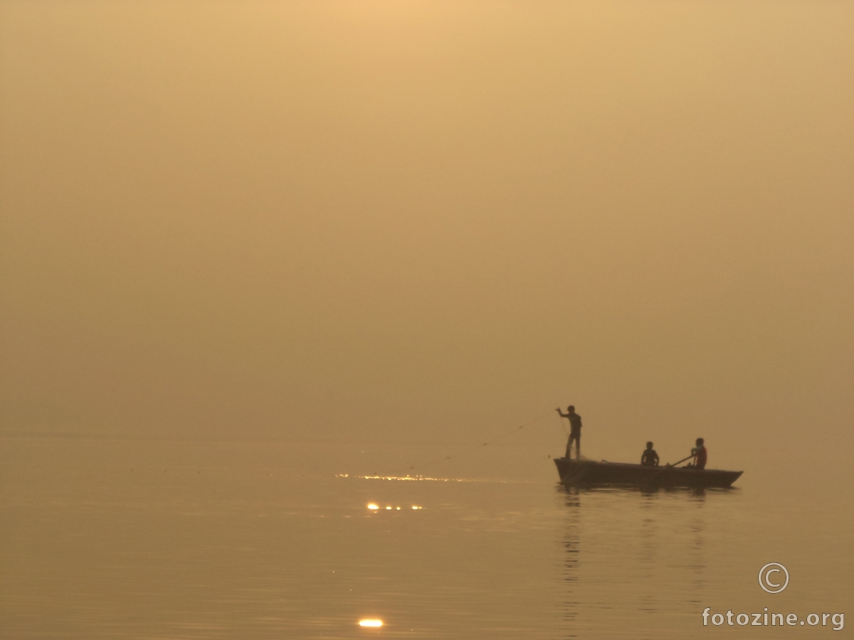 Fishing in the holy water of the Ganga
