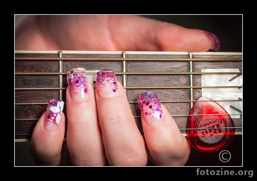 Her nails...but my guitar :)